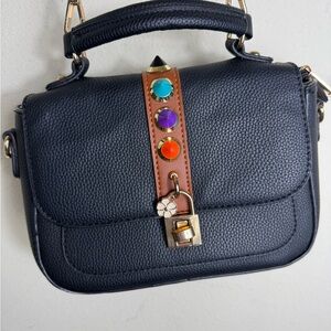 Stylish Black Handbag with Colorful Accents